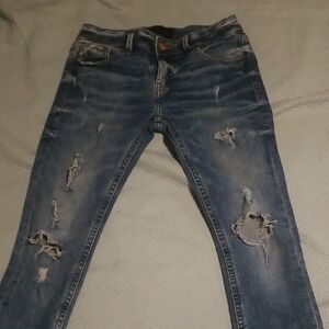 Buckle Distressed Denim Skinny Jeans